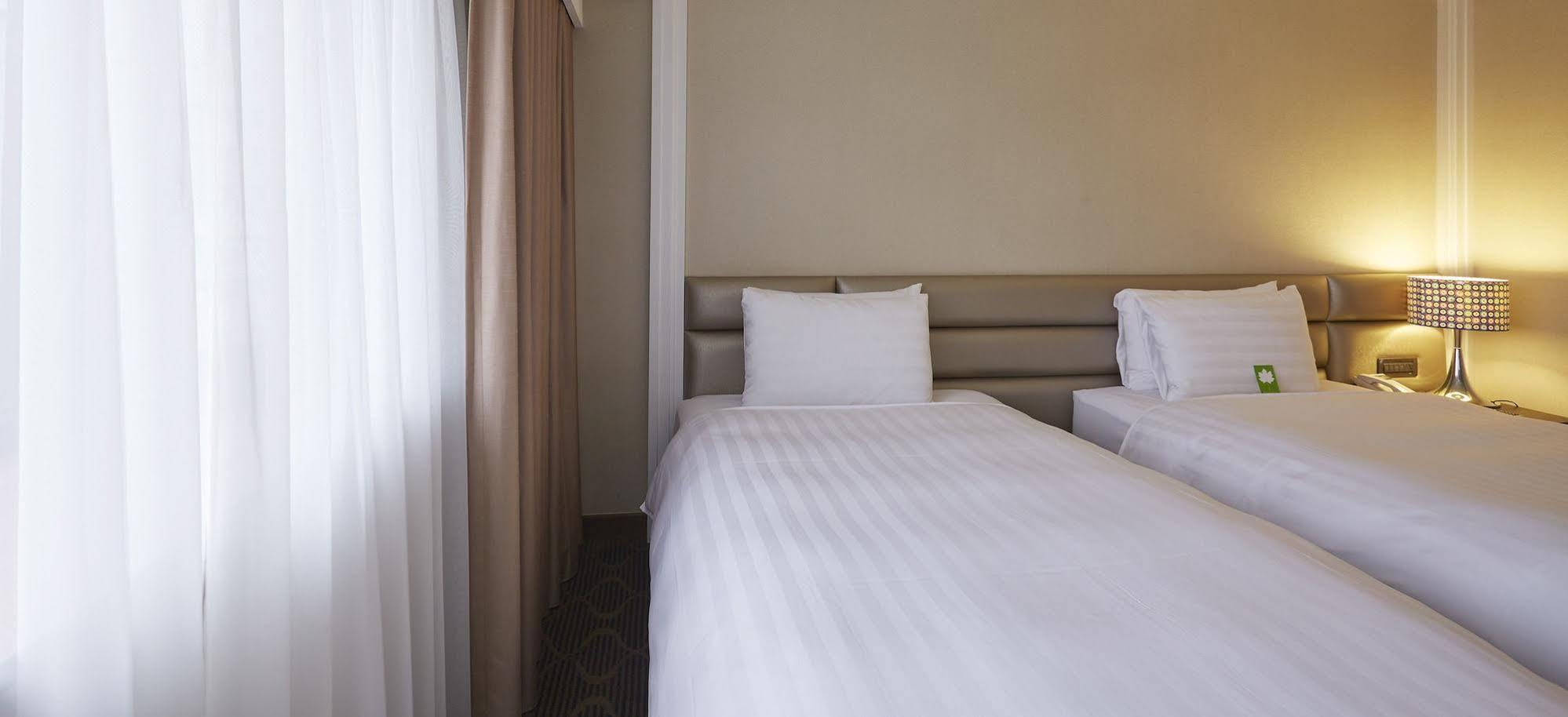 Grand City Hotel Phong Nguyên Ngoại thất bức ảnh