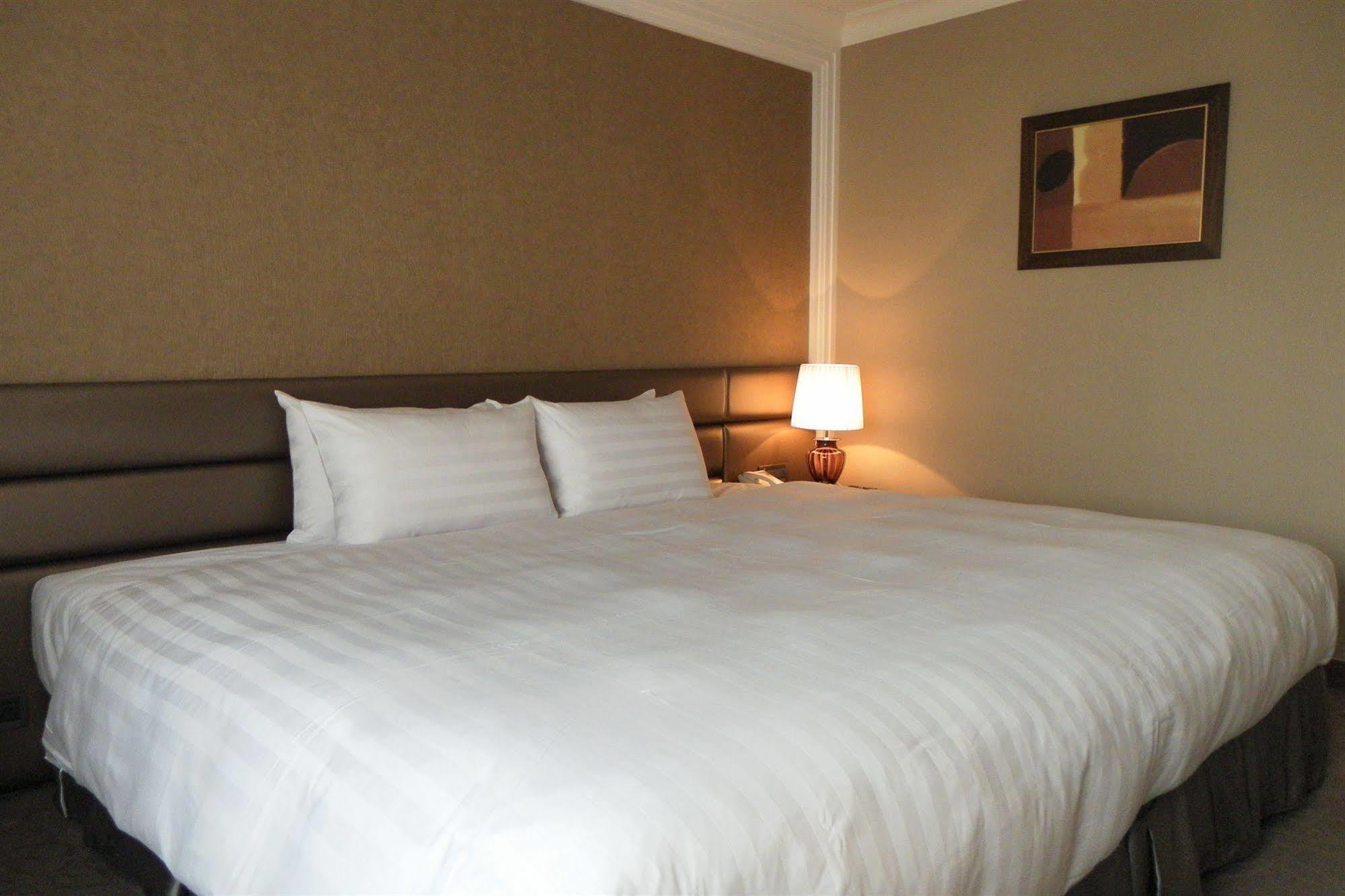 Grand City Hotel Phong Nguyên Ngoại thất bức ảnh